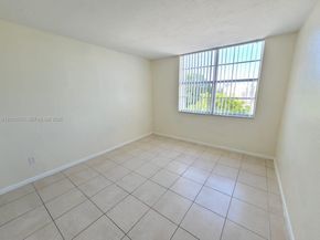 496 NW 165th St Rd D409, Miami FL 33169