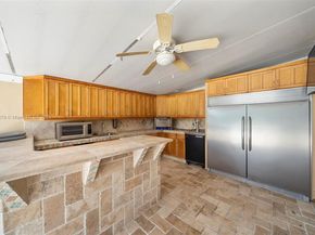 13240 N Calusa Club Dr, Miami FL 33186