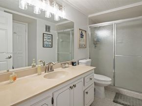 301 Racquet Club Rd 104, Weston FL 33326