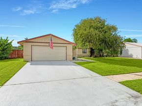 1403 Donwoods Lane, Royal Palm Beach FL 33411