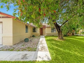 1403 Donwoods Lane, Royal Palm Beach FL 33411