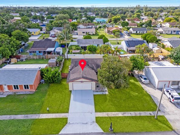 1403 Donwoods Lane, Royal Palm Beach FL 33411