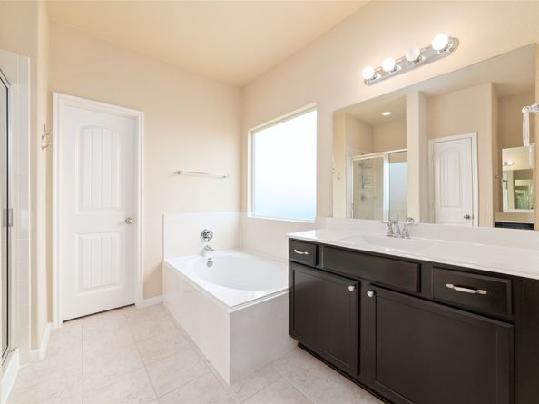 25307 Saddlebrook Champion Way, Tomball TX 77375
