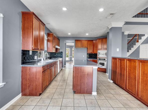 16715 Hibiscus Point Drive, Houston TX 77095