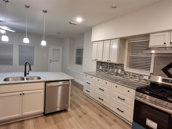 6887 Turtlewood Drive, Houston TX 77072