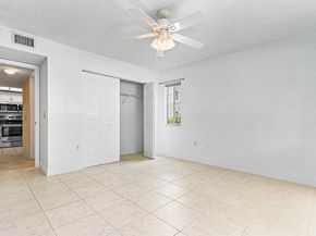 5051 Wiles Road 107, Coconut Creek FL 33073