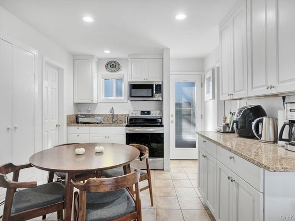 62 Canoe Place Road 513/5, Hampton Bays NY 11946