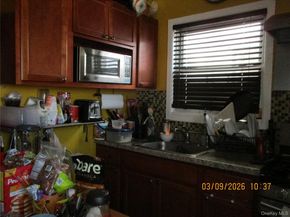 94-10 82nd Place, Ozone Park NY 11416