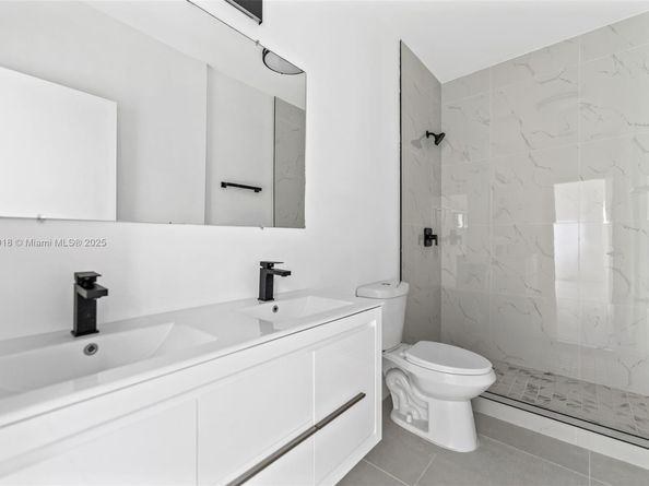 5318 NW 7 ct, Miami FL 33127