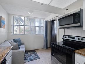 100 Golden Isles Dr 101, Hallandale Beach FL 33009