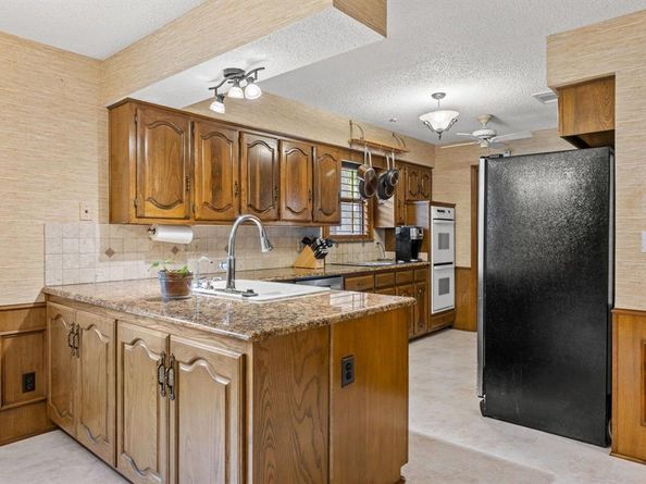 9911  Glen Canyon Drive , Dallas Texas 75243