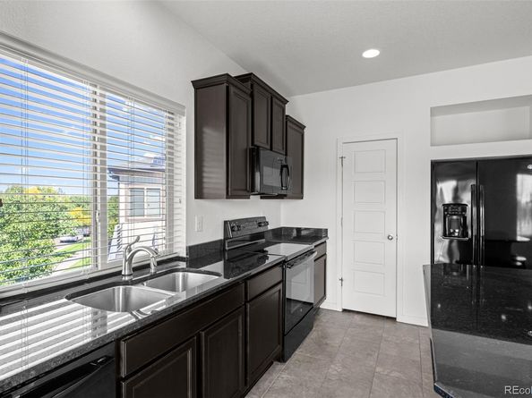 4891 Halifax Court, Denver CO 80249