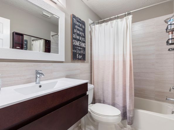 31 N Spinning Wheel Circle, The Woodlands TX 77382