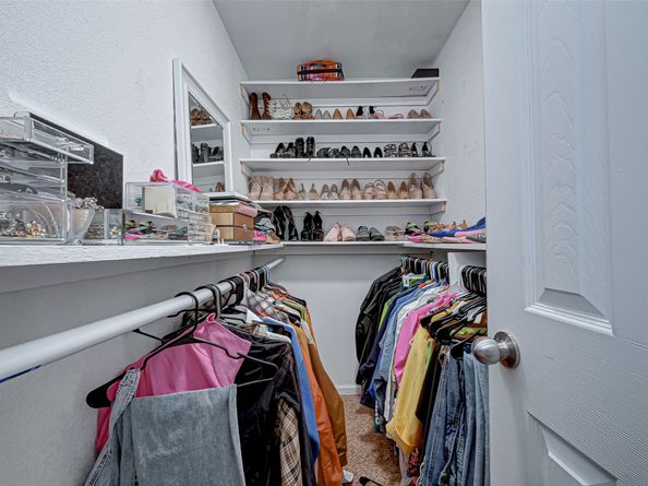 4 Carlota Court, Houston TX 77074
