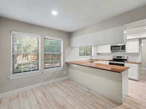 34 E Wandering Oak Drive, The Woodlands TX 77381