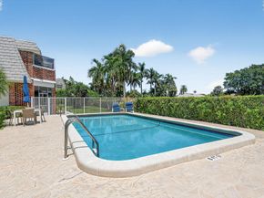 324 Orange Tree Drive 5, Atlantis FL 33462