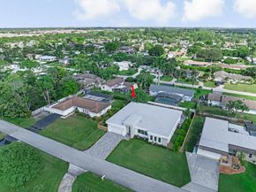 68 W Plumosa Lane, Lake Worth FL 33467