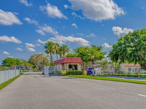 100 Lake Meryl Dr 201, West Palm Beach FL 33411