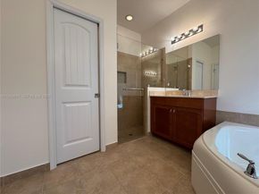 4830 Foxtail Palm Ct, Green Acres FL 33463