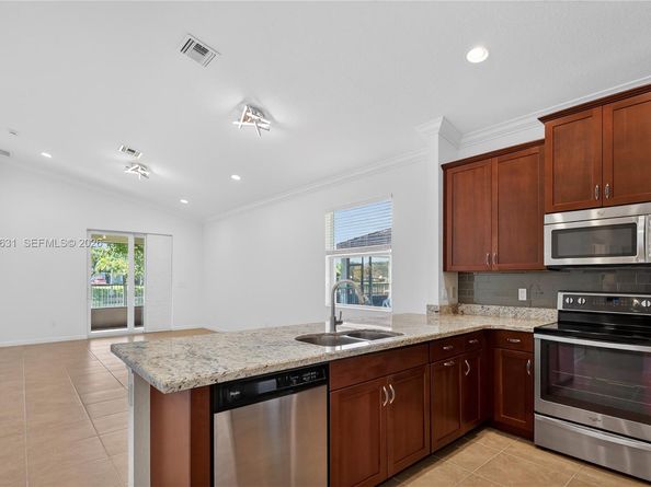 4830 Foxtail Palm Ct, Green Acres FL 33463