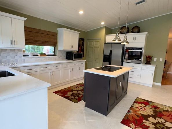 9099 NW 47th Ct, Coral Springs FL 33067