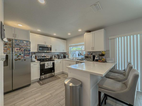 1260 NW 112th Way, Coral Springs FL 33071
