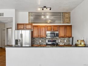 15475 Andrews Drive 204, Denver CO 80239
