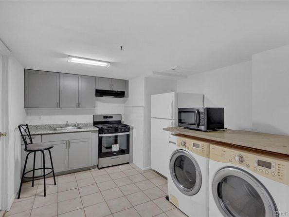 415 Pond Path, East Setauket NY 11733