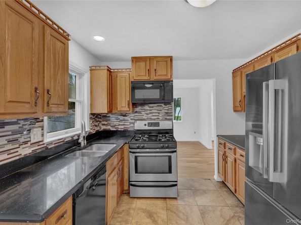 415 Pond Path, East Setauket NY 11733