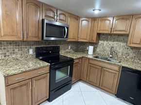 491 Racquet Club Rd 303, Weston FL 33326