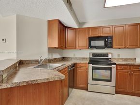 8891 Wiles Rd 102, Coral Springs FL 33067