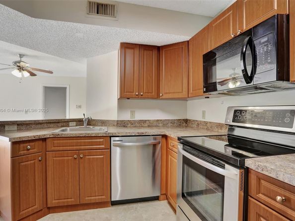 8891 Wiles Rd 102, Coral Springs FL 33067