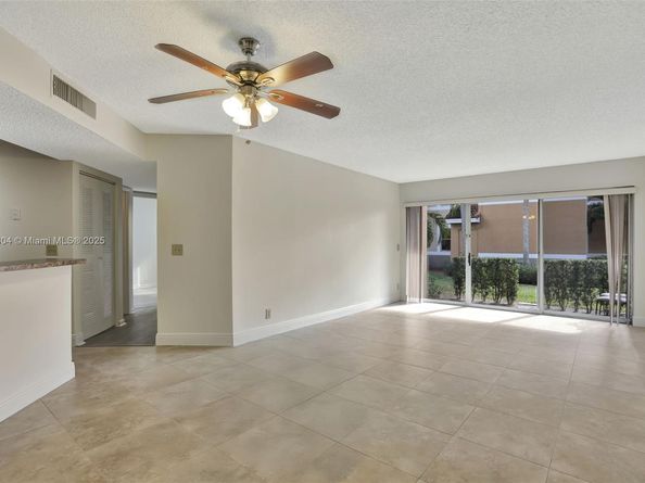 8891 Wiles Rd 102, Coral Springs FL 33067