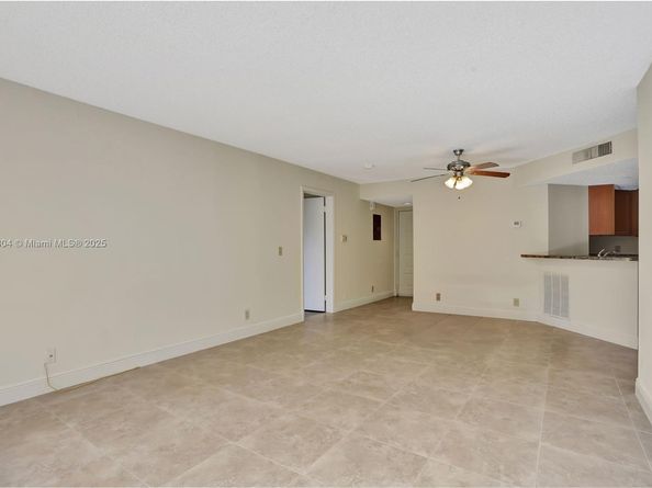 8891 Wiles Rd 102, Coral Springs FL 33067