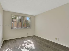 8891 Wiles Rd 102, Coral Springs FL 33067