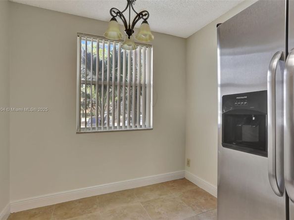 8891 Wiles Rd 102, Coral Springs FL 33067
