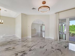 100 N Country Club Boulevard, Atlantis FL 33462