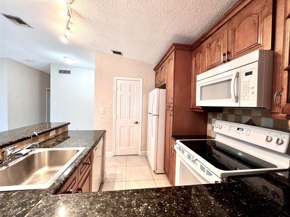 22303 Misty Woods Way, Boca Raton FL 33428