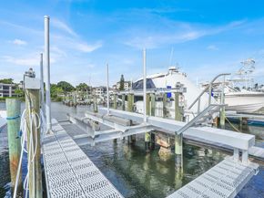 1660 Twelve Oaks Way 101 & 50 Ft. Dock & 30k L, North Palm Beach FL 33408