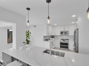 1660 Twelve Oaks Way 101 & 50 Ft. Dock & 30k L, North Palm Beach FL 33408