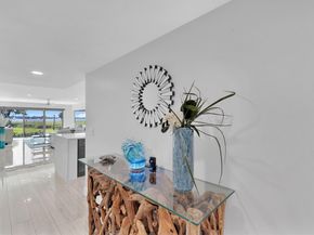 1660 Twelve Oaks Way 101 & 50 Ft. Dock & 30k L, North Palm Beach FL 33408