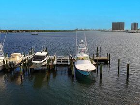 1660 Twelve Oaks Way 101 & 50 Ft. Dock & 30k L, North Palm Beach FL 33408