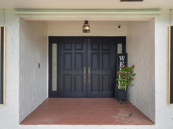 516 Muirfield Drive, Atlantis FL 33462