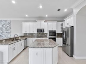 9860 Lakeview Ln, Parkland FL 33076