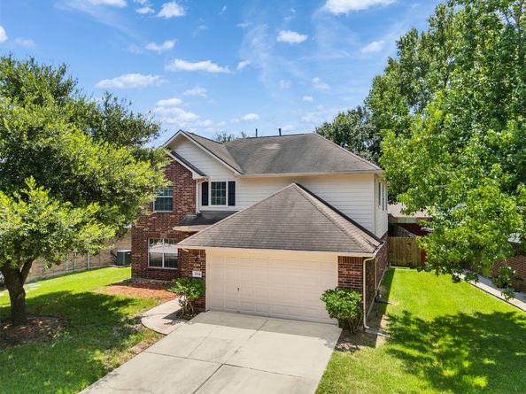 7034 Atasca Creek Drive, Humble TX 77346