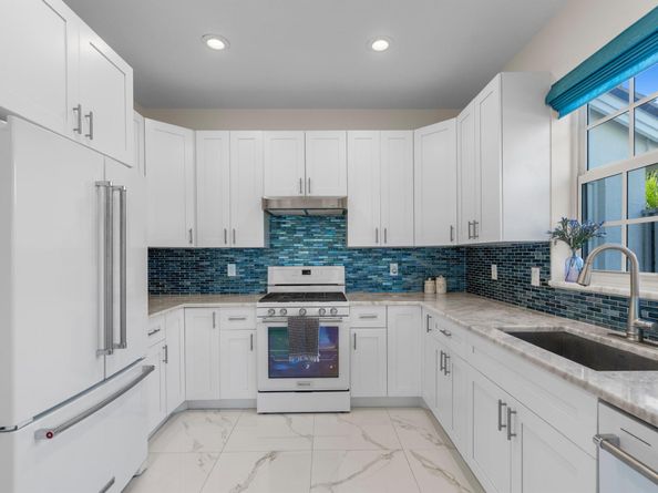 903 Augusta Pointe Drive, Palm Beach Gardens FL 33418