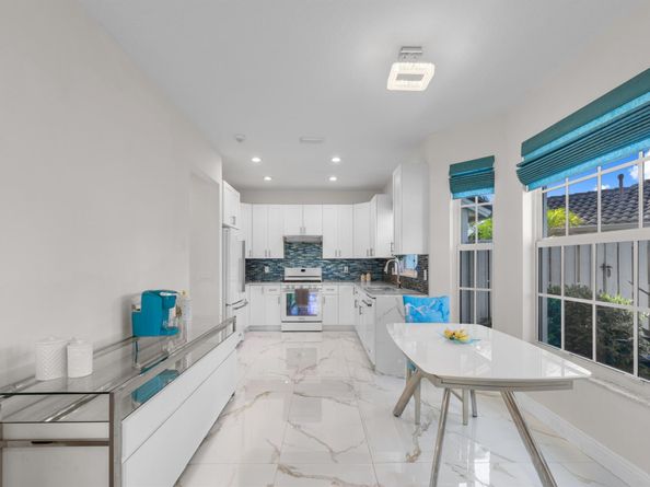 903 Augusta Pointe Drive, Palm Beach Gardens FL 33418