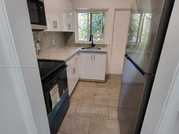 7710 NE 1st Ct, Miami FL 33138