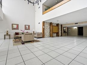 491 E Racquet Club Rd 107, Weston FL 33326