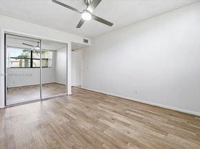 491 E Racquet Club Rd 107, Weston FL 33326